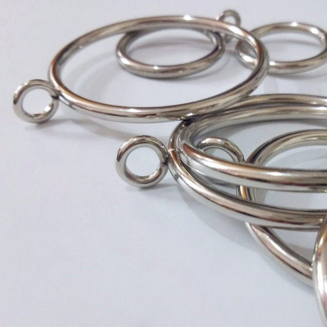 Gardinenringe aus Metall in Altmessing