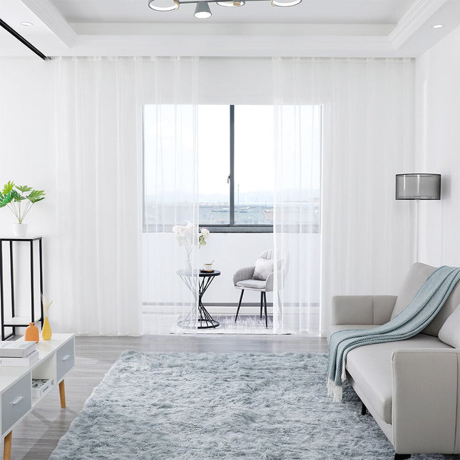 Transparente Gardine in natürlicher Leinenoptik