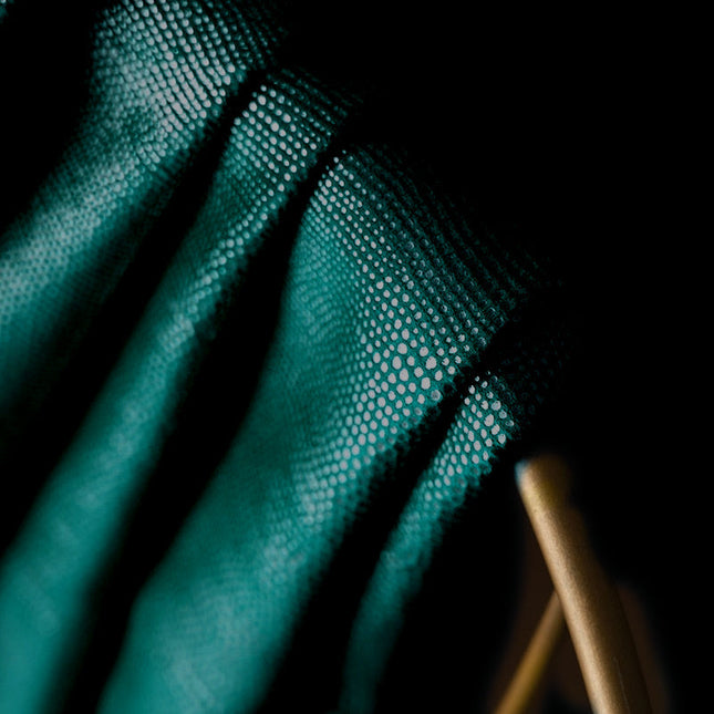 Verdunkelungsvorhang Petrolgrün mit glänzendem Punktmuster